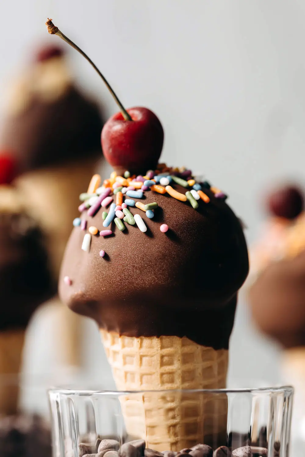 Blank Crispy Ice Cream Cone In Glass Container Stock Photo